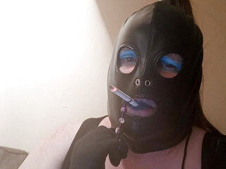 BBW TV smoking a cigarette using a ring holder and talking dirty