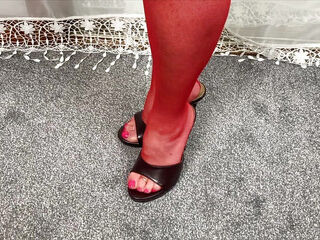 Mrs Mature Feet wearing her sexy red fishnet hold ups and wearing her waspie