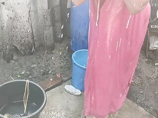 Anita yadav bathing outside with sizzling