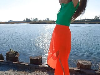 Longpussy, Sheer orange miniskirt, Tight green Tee, intense Piercings with Lights. Blessed Fall!