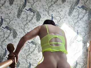 Sexy Mature Crossdressing Sissy Slut in yellow lingerie and limp dick in chastity rides some of her dildos