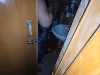 My stepsister was taking a shower with the door open and I was peeking in.