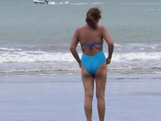 Stepson for the first time has sex with beautiful stepmother on the beach