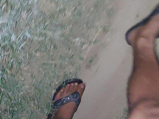 Boy walking naked in the jungle