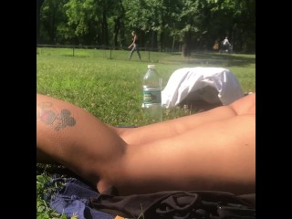 Panty showcasing leotard sunbathing in Central Park NYC